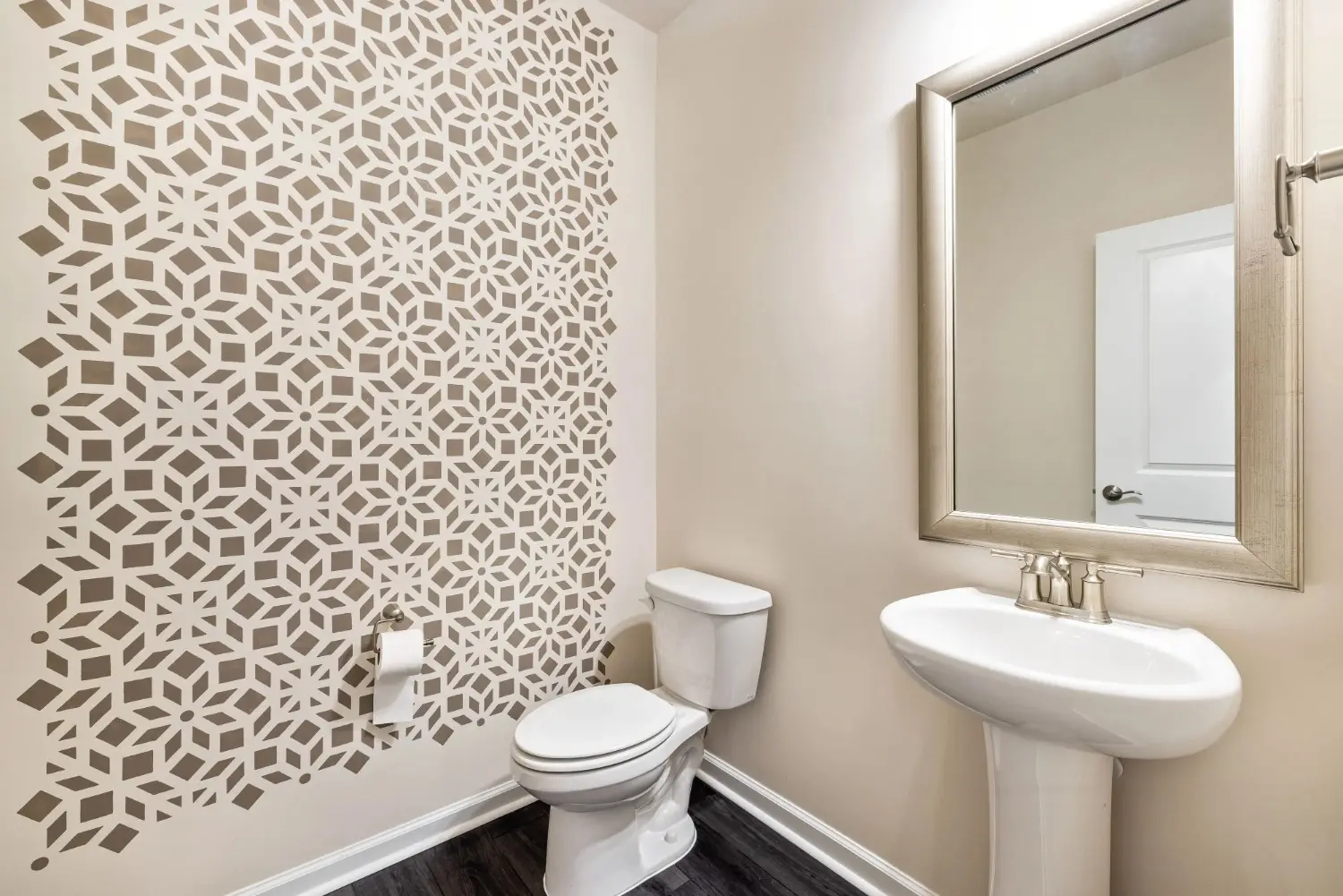 New faucet, sink, and wall-mounted fixtures added during a powder room remodel in Lemont, IL.