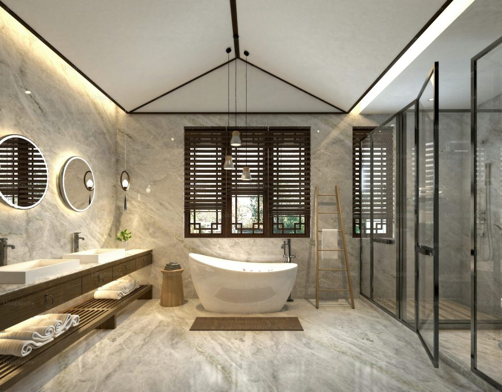 Remodeling crew installing custom tile shower in a modern Aurora, IL bathroom