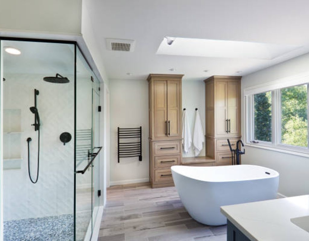 Professional team installing custom shower designs in residential bathroom
