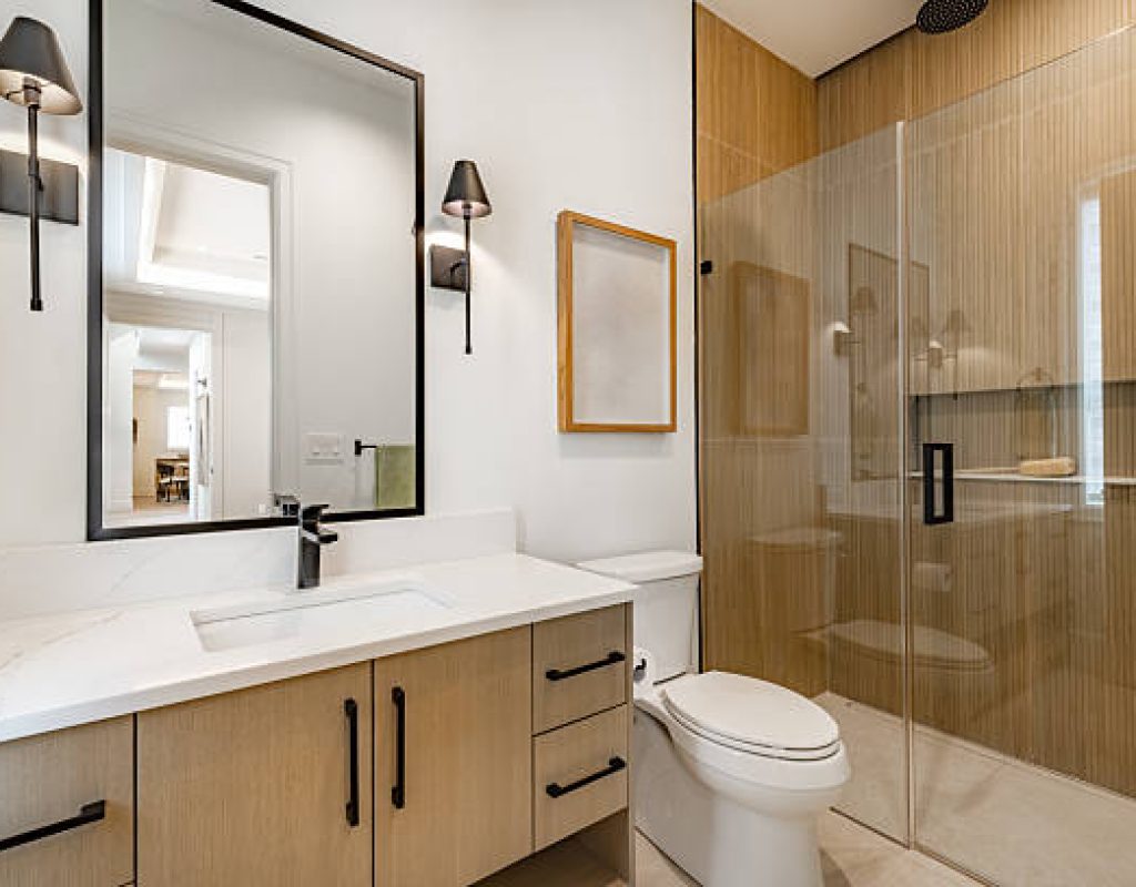 ACS Bathroom Remodeling team installing custom showers with expert craftsmanship.