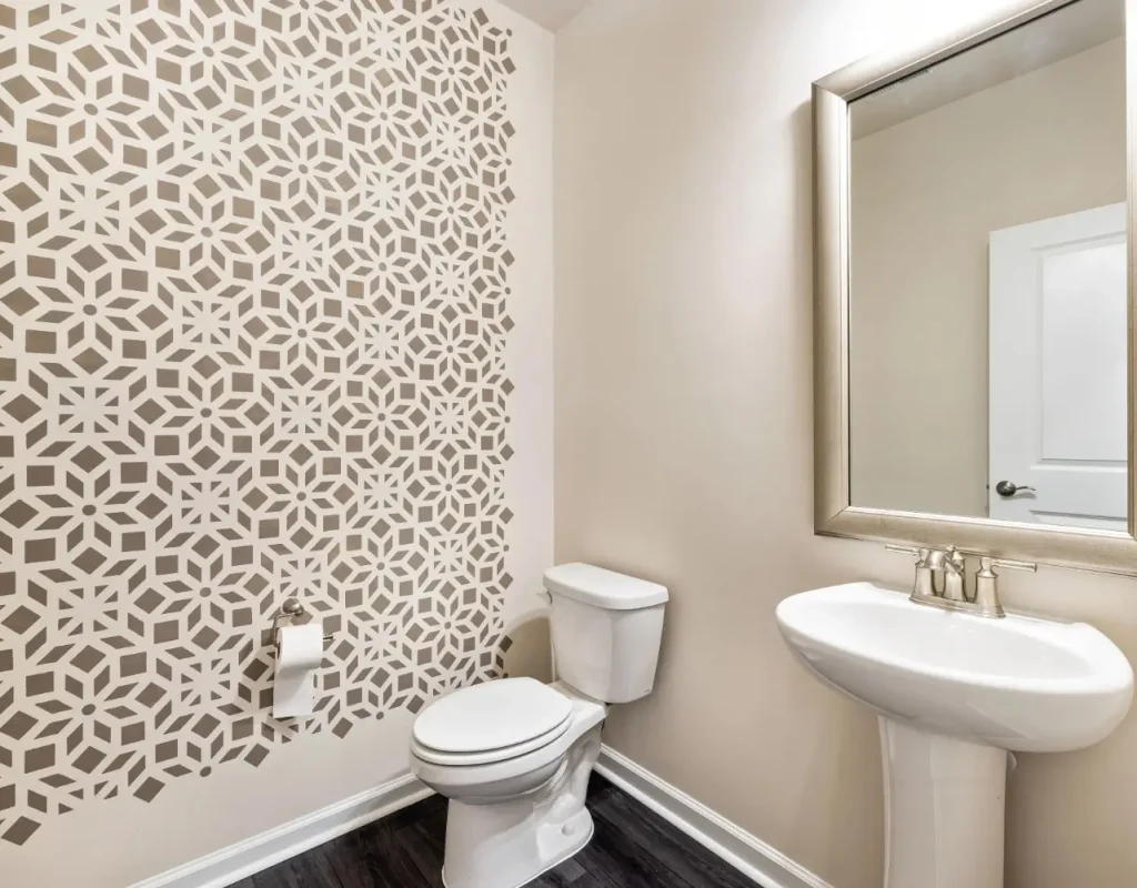 New faucet, sink, and wall-mounted fixtures added during a powder room remodel in Lemont, IL.