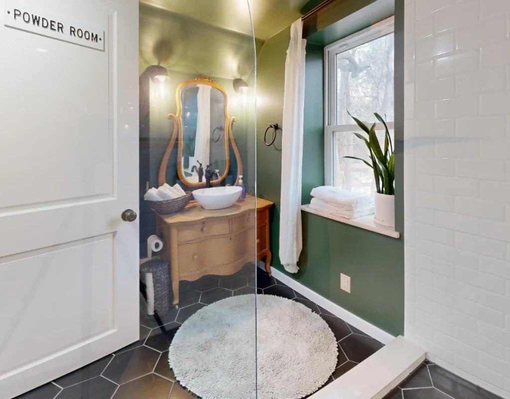 Space-saving vanity and storage upgrades included in a powder room remodel in Elgin, IL.